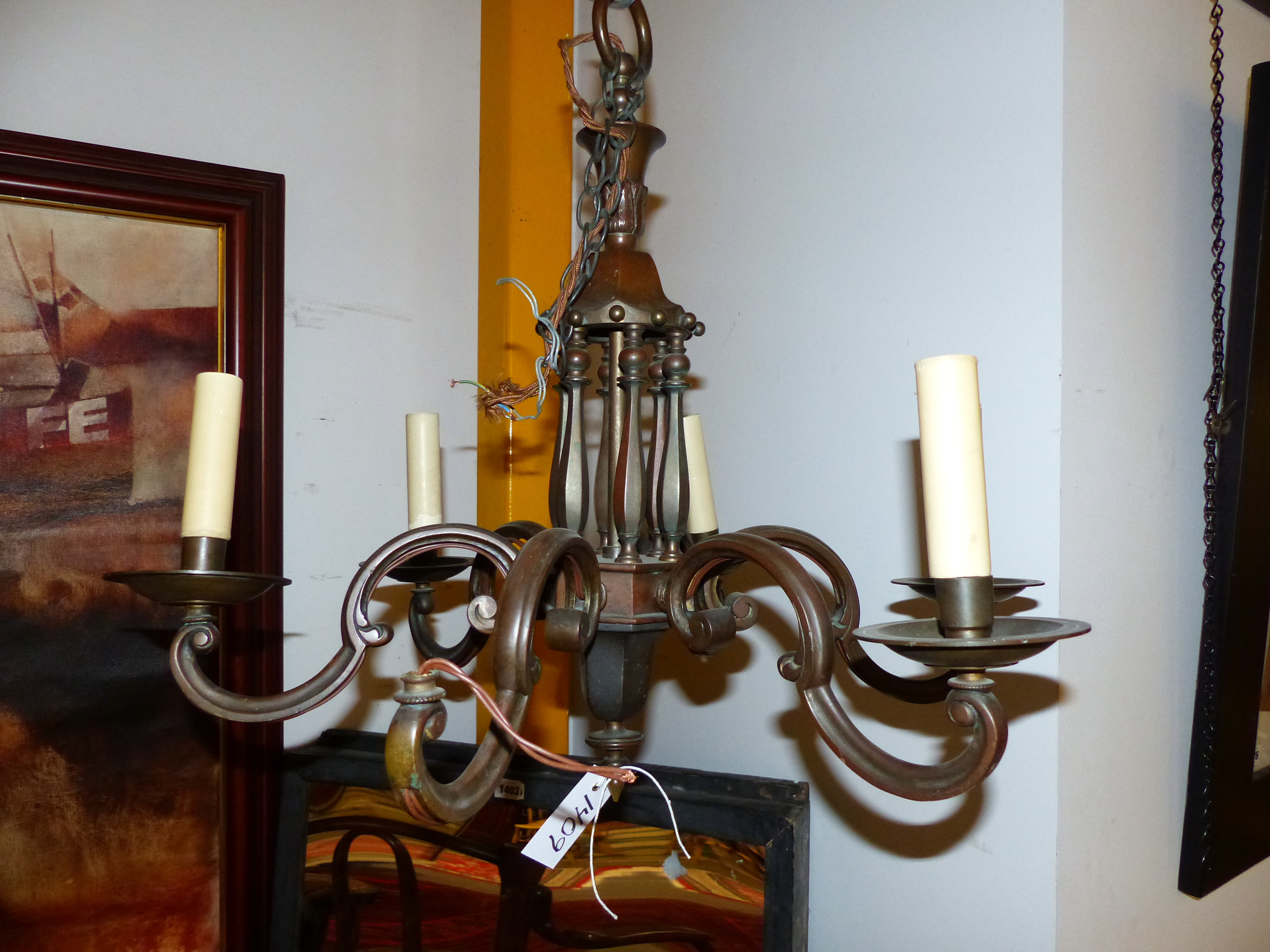 AN EARLY 20th.C.PATINATED BRONZE SIX LIGHT CHANDELIER IN THE DUTCH TASTE. H.55cms.