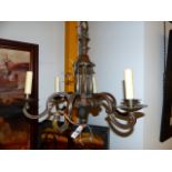 AN EARLY 20th.C.PATINATED BRONZE SIX LIGHT CHANDELIER IN THE DUTCH TASTE. H.55cms.