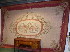 A LARGE NEEDLEPOINT CARPET OF FRENCH AUBUSSON DESIGN.