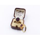 A 22ct HALLMARKED GARNET CLAW SET RING DATED 1860, LONDON TOGETHER WITH AN 18ct GARNET INTAGLIO RING