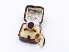 A 22ct HALLMARKED GARNET CLAW SET RING DATED 1860, LONDON TOGETHER WITH AN 18ct GARNET INTAGLIO RING