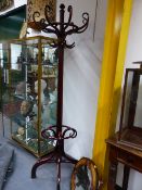 A VINTAGE THONET BENTWOOD HAT AND COAT STAND WITH REVOLVING TOP SECTION, THE BASE STAMPED THONET,