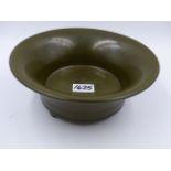A CHINESE TEA DUST GLAZE FLARED FORM BOWL WITH IMPRESSED SEAL MARKS TO BASE, RAISED ON TRIFID
