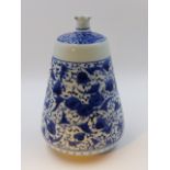 A JAPANESE BLUE AND WHITE TAPERED FORM BOTTLE VASE WITH SCROLLING FOLIATE DECORATION. H.22cms.