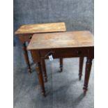 A PAIR OF VICTORIAN PINE ONE DRAWER TABLES WITH TURNED TAPERED LEGS. W.76cms x D.45cms x H.81cms.