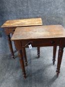 A PAIR OF VICTORIAN PINE ONE DRAWER TABLES WITH TURNED TAPERED LEGS. W.76cms x D.45cms x H.81cms.