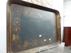 A LARGE REGENCY GILT AND FLORAL DECORATED PAPIER MACHE TRAY. W.82cms.