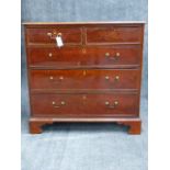 A GEORGIAN MAHOGANY CHEST WITH MOULDED EDGE TOP, TWO SHORT DRAWERS OVER THREE LONG DRAWERS ON