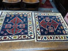 A PAIR OF ANTIQUE CAUCASIAN BAGFACES. 43 x 41cms.