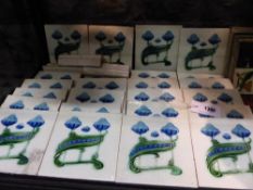 A COLLECTION OF ART NOUVEAU POTTERY TILES OF VARYING DESIGN. (APPROX 50)