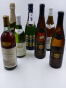 A MIXED LOT OF SEVEN BOTTLES TO INCLUDE SPARKLING AND GERMAN WINE.