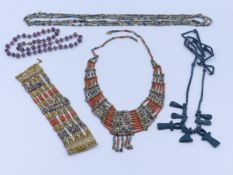 A GROUP OF VARIOUS FAIENCE TYPE GLAZED BEAD NECKLACES, ETC TO INCLUDE ONE IN THE EGYPTIAN MANNER.