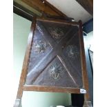 TWO OAK FRAMED ARTS AND CRAFTS FIRE SCREEN, ONE WITH FLORAL CREWEL WORK INSET THE OTHER REPOUSSE