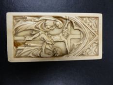 AN EARLY CARVED IVORY PLAQUE OF THE CRUCIFICTION IN THE GOTHIC TASTE. 9.5 x 4.5cms.