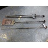 A SET OF THREE GEORGIAN STEEL FIRETOOLS.