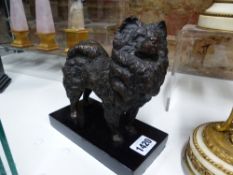 AN EARLY 20th.C. FINELY CAST BRONZE FIGURE OF A DOG, POSSIBLY RUSSIAN, MOUNTED ON A WOODEN BASE.