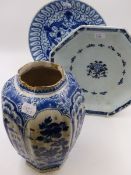 A DELFT POTTERY OCTAGONAL BALUSTER BLUE AND WHITE VASE. H.23cms, A DELFT POTTERY BLUE AND WHITE