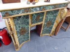 A PAINT DECORATED AND GILT BRASS MOUNTED FIRE SURROUND.