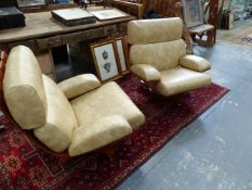 A RARE PAIR OF G-PLAN HOUSE MASTER SWIVEL ARMCHAIRS.