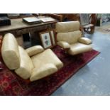 A RARE PAIR OF G-PLAN HOUSE MASTER SWIVEL ARMCHAIRS.