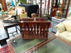 A RETRO ROSEWOOD MAGAZINE STAND AND AN OAK STAND.