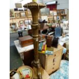 A GILT DECORATED STANDARD LAMP.