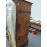 AN UNUSUAL ELM HALL CABINET WITH WROUGHT IRON HINGES.