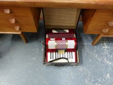 A BELL PIANO ACCORDIAN.