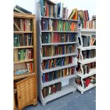 A GREY PAINTED WATERFALL BOOKCASE.