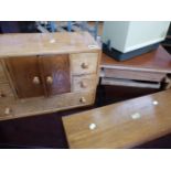 A SMALL OAK NEST OF DRAWERS AND A COLLECTOR'S BOX.