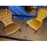 A NEAR PAIR OF BUTTON BACK SHOW FRAME NURSING CHAIRS.