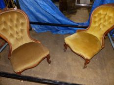 A NEAR PAIR OF BUTTON BACK SHOW FRAME NURSING CHAIRS.