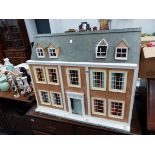 A LARGE DOLLS HOUSE AND VARIOUS FURNISHINGS.
