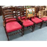 A SET OF EIGHT 18th.C.STYLE LANCASHIRE LADDER BACK DINING CHAIRS.