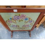 AN ART DECO FOLDING FIRESCREEN/TABLE.