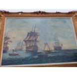 A LARGE GILT FRAMED OILEOGRAPH, BATTLE SHIPS AT SEA.