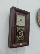 A VICTORIAN WALL CLOCK.