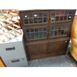 A VINTAGE THREE TIER OAK SECTIONAL BOOKCASE TOGETHER WITH A SMALL METAL FILING CABINET AND A SMALL