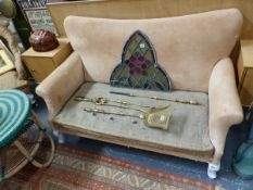 AN EDWARDIAN SMALL SOFA FOR UPHOLSTERY.