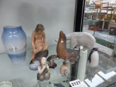 NINE PIECES OF ROYAL COPENHAGEN WARE TO INCLUDE A POLAR BEAR, SEAL, MERMAIDS ETC.