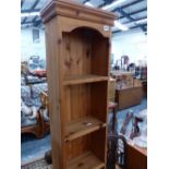 A SMALL PINE NARROW BOOKCASE AND TWO LOW TEAK BOOKCASES.