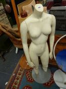 A VINTAGE FEMALE MANNEKIN.