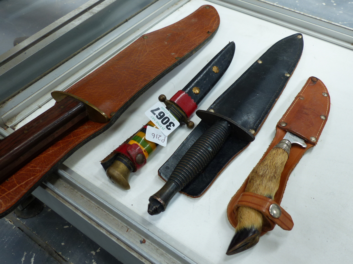 FOUR VARIOUS KNIVES WITH SHEATHS.