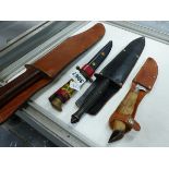 FOUR VARIOUS KNIVES WITH SHEATHS.