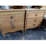 A PAIR OF PINE THREE DRAWER BEDSIDE CHESTS.