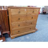 A LATE VICTORIAN ASH CHEST OF TWO SHORT AND THREE LONG DRAWERS.