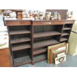 AN ANTIQUE MAHOGANY BREAK FRONT BOOKCASE.