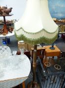 A GILT DECORATED STANDARD LAMP, A MIRROR AND TWO SHELVES.