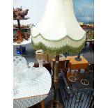 A GILT DECORATED STANDARD LAMP, A MIRROR AND TWO SHELVES.