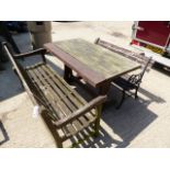 TWO GARDEN BENCHES AND A GARDEN TABLE.